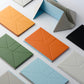 Foldable laptop stand shown in six color options