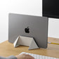 Foldable laptop stand on a desk workspace